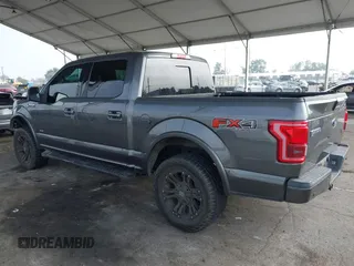 2016 Ford F-150 XLT with VIN 1FTEW1EG8GKE16490, listed as a IAAI auction lot 40622454 with 156,573 mi miles. Bid and sale history available at carsss.com. Image 3.