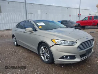2016 Ford Fusion Titanium Hybrid with VIN 3FA6P0RU0GR122515, listed as a IAAI auction lot 42099984 with 153,006 mi miles and . Bid and sale history available at DreamBid. Image 1.