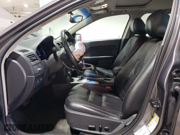 2012 Ford Fusion SEL with VIN 3FAHP0JA1CR112354, listed as a Copart auction lot 51140345 with 138,893 mi miles and Salvage Title. Bid and sale history available at DreamBid. Image 7.