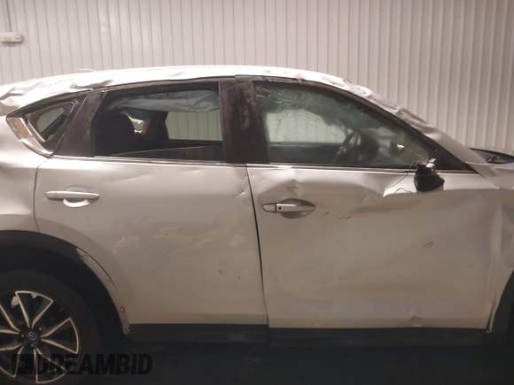 2018 Mazda CX-5 Touring with VIN JM3KFBCM7J0347769, listed as a IAAI auction lot 41611985 with 158,579 mi miles. Bid and sale history available at carsss.com. Image 14.