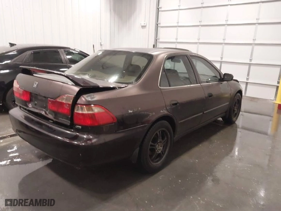 1999 Honda Accord Sdn EX with VIN 1HGCG1655XA012104, listed as a IAAI auction lot 41301577 with 172075 miles. Bid and sale history available at carsss.com. Image 4.
