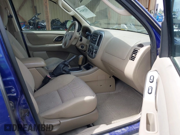 2005 Ford Escape XLT with VIN 1FMYU93195KA35708, listed as a IAAI auction lot 42130239 with 230,920 mi miles. Bid and sale history available at carsss.com. Image 5.