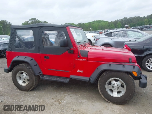 1999 Jeep Wrangler SE z VIN 1J4FY29P5XP487111, wystawiony jako IAAI lot #42125867 z przebiegiem 156 804 mil mil oraz . Historia ofert i sprzedaży dostępna na DreamBid. Obrazek 13.