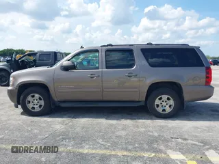 2012 Chevrolet Suburban LT with VIN 1GNSKJE72CR130111, listed as a IAAI auction lot 42699365 with 216,827 mi miles and . Bid and sale history available at DreamBid. Image 14.