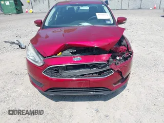 2017 Ford Focus SE z VIN 1FADP3F26HL305624, wystawiony jako IAAI lot #42411111 z przebiegiem 58 865 mil mil oraz . Historia ofert i sprzedaży dostępna na DreamBid. Obrazek 6.