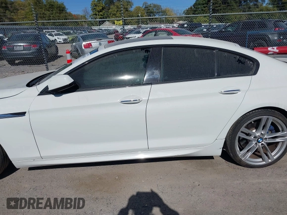 2015 BMW 6 Series 640i with VIN WBA6A0C54FGB53785, listed as a IAAI auction lot 40612020 with 67,524 mi miles and . Bid and sale history available at DreamBid. Image 14.