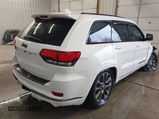 2018 Jeep Grand Cherokee High Altitude with VIN 1C4RJFCGXJC501865, listed as a IAAI auction lot 41364301 with 65,117 mi miles. Bid and sale history available at carsss.com. Image 4.
