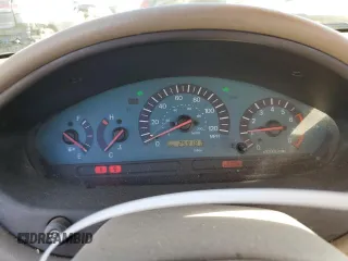 2002 Mitsubishi Galant ES z VIN 4A3AA46G12E123287, wystawiony jako Copart lot #74540784 z przebiegiem 259 181 mil mil oraz Szkoda całkowita • Salvage title. Historia ofert i sprzedaży dostępna na DreamBid. Obrazek 9.
