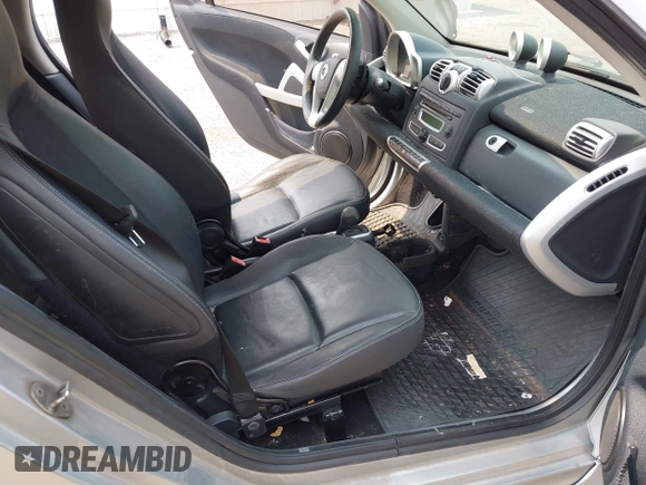 2009 Smart fortwo Pure with VIN WMEEJ31X39K276062, listed as a IAAI auction lot 42383073 with 108,190 mi miles and . Bid and sale history available at DreamBid. Image 5.