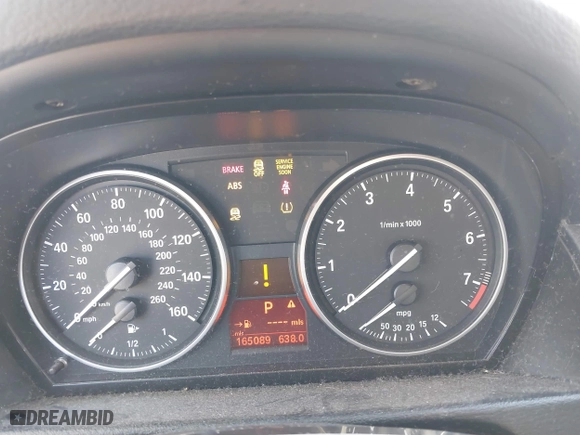 2014 BMW X1 sDrive28i with VIN WBAVM1C57EVW52502, listed as a IAAI auction lot 41702746 with 165,089 mi miles. Bid and sale history available at carsss.com. Image 7.
