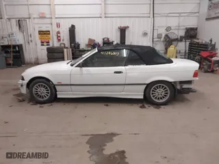 1997 BMW 3-Series 328IC with VIN WBABK832XVET95942, listed as a IAAI auction lot 41246303 with 165,825 mi miles. Bid and sale history available at carsss.com. Image 14.