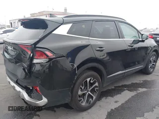 2023 Kia Sportage EX with VIN KNDPVCAG1P7043695, listed as a IAAI auction lot 42505834 with 16,192 mi miles and . Bid and sale history available at DreamBid. Image 4.