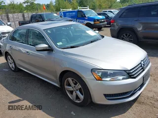 2013 Volkswagen Passat SE with VIN 1VWBP7A35DC009445, listed as a IAAI auction lot 42758243 with 191,412 mi miles and . Bid and sale history available at DreamBid. Image 1.