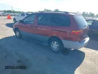 1998 Toyota Sienna LE with VIN 4T3ZF13CXWU003140, listed as a IAAI auction lot 42218556 with 230,679 mi miles and . Bid and sale history available at DreamBid. Image 3.