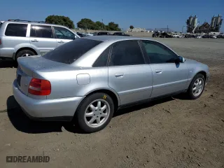 1999 Audi A4 with VIN WAUBB28DXXA299469, listed as a Copart auction lot 65596934 with 207,289 mi miles and Salvage Title. Bid and sale history available at carsss.com. Image 3.