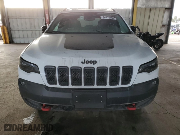2022 Jeep Cherokee Trailhawk with VIN 1C4PJMBX6ND556259, listed as a Copart auction lot 44730605 with 55,328 mi miles and Non Repairable. Bid and sale history available at carsss.com. Image 5.