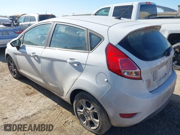 2016 Ford Fiesta SE z VIN 3FADP4EJ5GM136658, wystawiony jako IAAI lot #41312966 z przebiegiem 145 561 mil mil oraz . Historia ofert i sprzedaży dostępna na DreamBid. Obrazek 3.