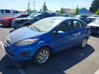 2011 Ford Fiesta SE with VIN 3FADP4BJ6BM145768, listed as a IAAI auction lot 42192387 with 159,825 mi miles and . Bid and sale history available at carsss.com. Image 2.