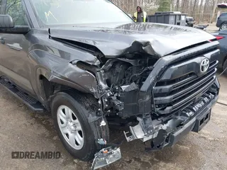 2023 Toyota Tundra with VIN 5TFKB5GDXPX002218, listed as a IAAI auction lot 41932719 with 71,335 mi miles and . Bid and sale history available at DreamBid. Image 6.