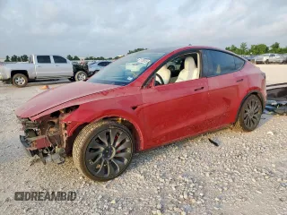 2022 Tesla Model Y Performance z VIN 7SAYGDEF3NF441944, wystawiony jako Copart lot #57175555 z przebiegiem 20 729 mil mil oraz Szkoda całkowita • Salvage title. Historia ofert i sprzedaży dostępna na DreamBid. Obrazek 1.