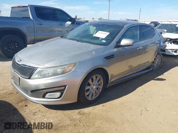 2014 Kia Optima EX z VIN 5XXGN4A74EG260054, wystawiony jako IAAI lot #41464688 z przebiegiem 40 498 mil mil oraz . Historia ofert i sprzedaży dostępna na DreamBid. Obrazek 17.