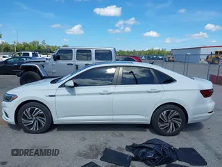 2021 Volkswagen Jetta SEL with VIN 3VWE57BU2MM047028, listed as a IAAI auction lot 42563875 with 56,695 mi miles and . Bid and sale history available at DreamBid. Image 14.