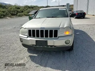 2007 Jeep Grand Cherokee Laredo z VIN 1J8GR48K17C596514, wystawiony jako Copart lot #54404755 z przebiegiem 230 033 mil mil oraz Szkoda całkowita • Salvage title. Historia ofert i sprzedaży dostępna na DreamBid. Obrazek 14.