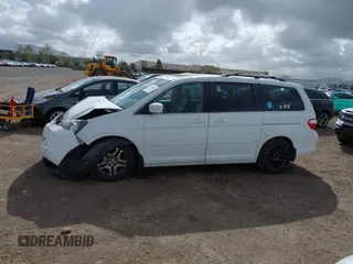2006 Honda Odyssey EX-L z VIN 5FNRL38766B452806, wystawiony jako IAAI lot #41931830 z przebiegiem 133 822 mil mil oraz . Historia ofert i sprzedaży dostępna na DreamBid. Obrazek 14.
