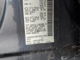 2013 Nissan Titan Pro-4X with VIN 1N6BA0EC2DN305708, listed as a Copart auction lot 45329275 with 68,636 mi miles and Salvage title. Bid and sale history available at DreamBid. Image 12.