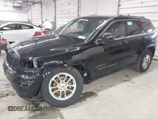 2018 Jeep Grand Cherokee Laredo E with VIN 1C4RJFAG0JC154937, listed as a IAAI auction lot 41966764 with 85,415 mi miles and . Bid and sale history available at DreamBid. Image 2.