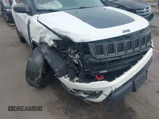2018 Jeep Compass Trailhawk with VIN 3C4NJDDB9JT174899, listed as a IAAI auction lot 41635784 with 124,656 mi miles and . Bid and sale history available at DreamBid. Image 6.