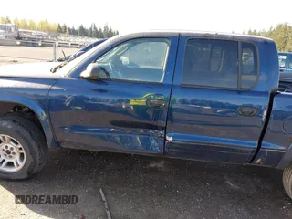 2004 Dodge Dakota Sport with VIN 1D7HG38K04S709680, listed as a IAAI auction lot 41993412 with 123,439 mi miles. Bid and sale history available at carsss.com. Image 6.