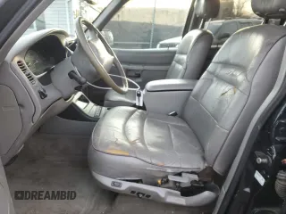 1997 Ford Explorer XL with VIN 1FMDU34E4VZC37151, listed as a Copart auction lot 85847234 with 260,538 mi miles and Salvage title. Bid and sale history available at DreamBid. Image 7.