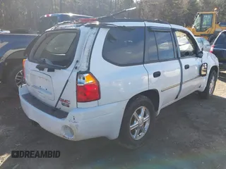 2008 GMC Envoy SLE2 with VIN 1GKDT13S282168352, listed as a IAAI auction lot 41667743 with 190,192 mi miles. Bid and sale history available at carsss.com. Image 4.