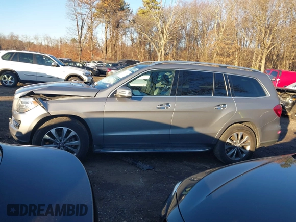 2015 Mercedes-Benz GL-Class GL 450 with VIN 4JGDF6EEXFA471143, listed as a IAAI auction lot 41062987 with 134,674 mi miles. Bid and sale history available at carsss.com. Image 14.