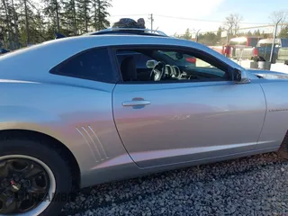 2011 Chevrolet Camaro 2LS z VIN 2G1FA1ED4B9117977, wystawiony jako IAAI lot #41570141 z przebiegiem 159 269 mil mil oraz . Historia ofert i sprzedaży dostępna na DreamBid. Obrazek 13.