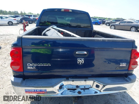 2005 Dodge Dakota SLT with VIN 1D7HW48N05S113487, listed as a IAAI auction lot 42029813 with 229,025 mi miles. Bid and sale history available at carsss.com. Image 17.