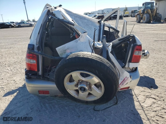 1998 Kia Sportage with VIN KNDJB7232W5569054, listed as a Copart auction lot 82756824 with 106,550 mi miles and Salvage Title. Bid and sale history available at carsss.com. Image 6.