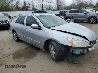 2005 Honda Accord EX with VIN 1HGCM56735A011693, listed as a Copart auction lot 52024445 with 240,754 mi miles and Salvage Title. Bid and sale history available at DreamBid. Image 4.