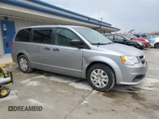 2019 Dodge Grand Caravan SE with VIN 2C4RDGBG2KR777707, listed as a Copart auction lot 46870455 with 129,404 mi miles and Clean Title. Bid and sale history available at DreamBid. Image 4.