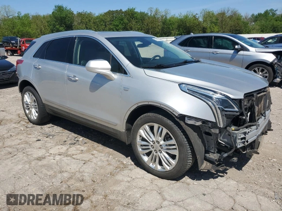 2019 Cadillac XT5 Premium Luxury AWD with VIN 1GYKNFRS6KZ233259, listed as a Copart auction lot 53647695 with 128,534 mi miles and Salvage title. Bid and sale history available at DreamBid. Image 4.