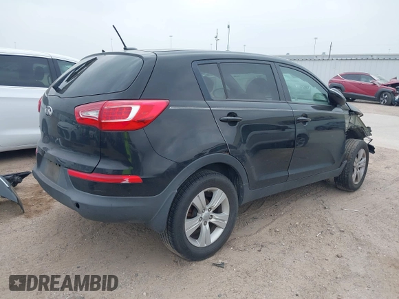 2013 Kia Sportage LX with VIN KNDPB3A20D7506063, listed as a IAAI auction lot 41796823 with 148,841 mi miles. Bid and sale history available at carsss.com. Image 4.