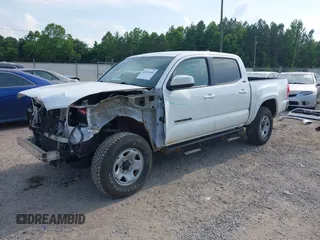 2017 Toyota Tacoma SR5 with VIN 3TMCZ5AN1HM063580, listed as a IAAI auction lot 42421660 with 95,543 mi miles and . Bid and sale history available at DreamBid. Image 22.