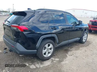2019 Toyota RAV4 XLE with VIN 2T3W1RFV8KW001328, listed as a IAAI auction lot 41961320 with 100,678 mi miles and . Bid and sale history available at DreamBid. Image 4.