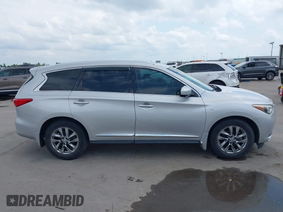 2015 Infiniti QX60 with VIN 5N1AL0MM7FC506839, listed as a IAAI auction lot 42134124 with 103,542 mi miles and . Bid and sale history available at DreamBid. Image 14.