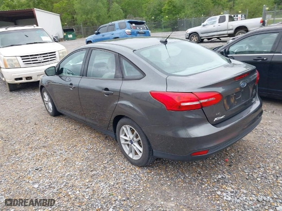 2018 Ford Focus SE with VIN 1FADP3FE9JL275194, listed as a IAAI auction lot 41979690 with 95,383 mi miles. Bid and sale history available at carsss.com. Image 3.