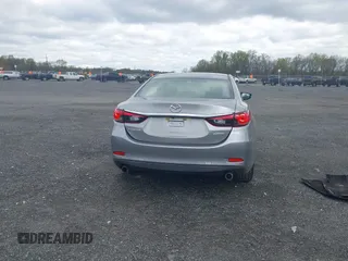 2014 Mazda 6 i Touring with VIN JM1GJ1V64E1147549, listed as a IAAI auction lot 42041025 with 124,400 mi miles and . Bid and sale history available at DreamBid. Image 16.