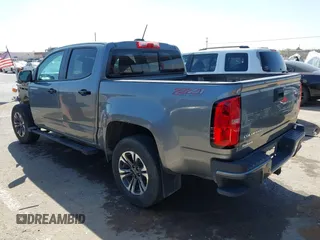 2021 Chevrolet Colorado 4WD Z71 z VIN 1GCGTDEN7M1117558, wystawiony jako IAAI lot #41911673 z przebiegiem 51 838 mil mil oraz . Historia ofert i sprzedaży dostępna na DreamBid. Obrazek 3.