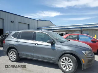 2020 Volkswagen Tiguan S with VIN 3VV0B7AX8LM025049, listed as a Copart auction lot 81767094 with 76,640 mi miles and Salvage title. Bid and sale history available at DreamBid. Image 4.