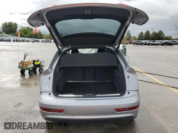 2015 Audi Q3 Prestige with VIN WA1GFCFS7FR012524, listed as a Copart auction lot 72800324 with 131,261 mi miles and Salvage title. Bid and sale history available at DreamBid. Image 6.